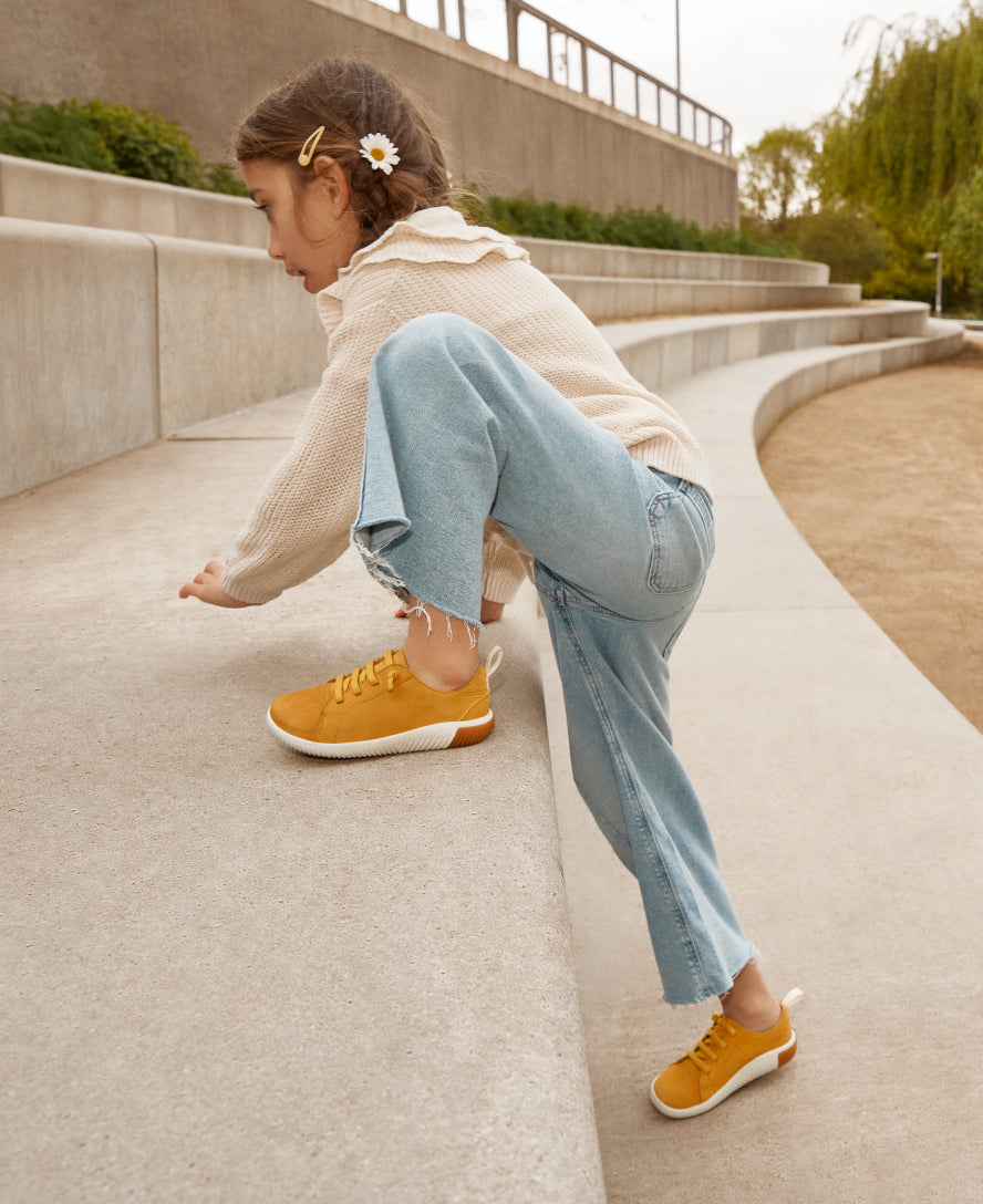 Big Kids' KNX Leather Sneaker | Gold Flame/Star White - Image 8